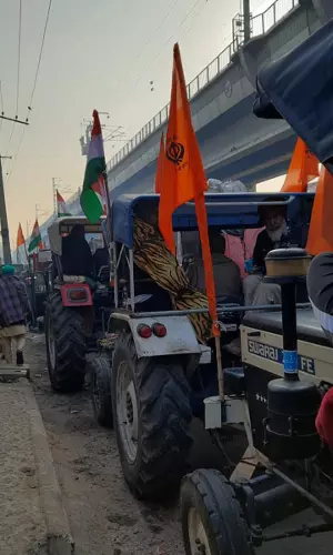 किसान आंदोलन: तस्वीरों के ज़रिये जाने ट्रैक्टर परेड को...