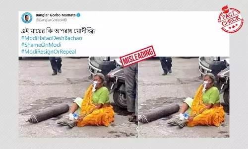 ऑक्सीजन सिलिंडर के साथ महिला की पुरानी फ़ोटो वर्तमान से जोड़कर की वायरल