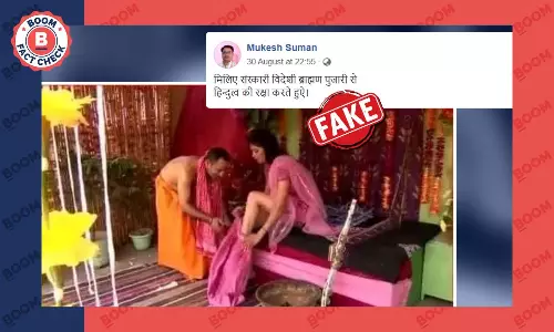 क्या इस वायरल तस्वीर में दिख रहा शख्स वास्तव में पुजारी है? फ़ैक्ट चेक