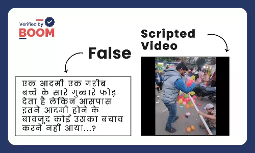 someone forcibly popping a childs balloon on the street