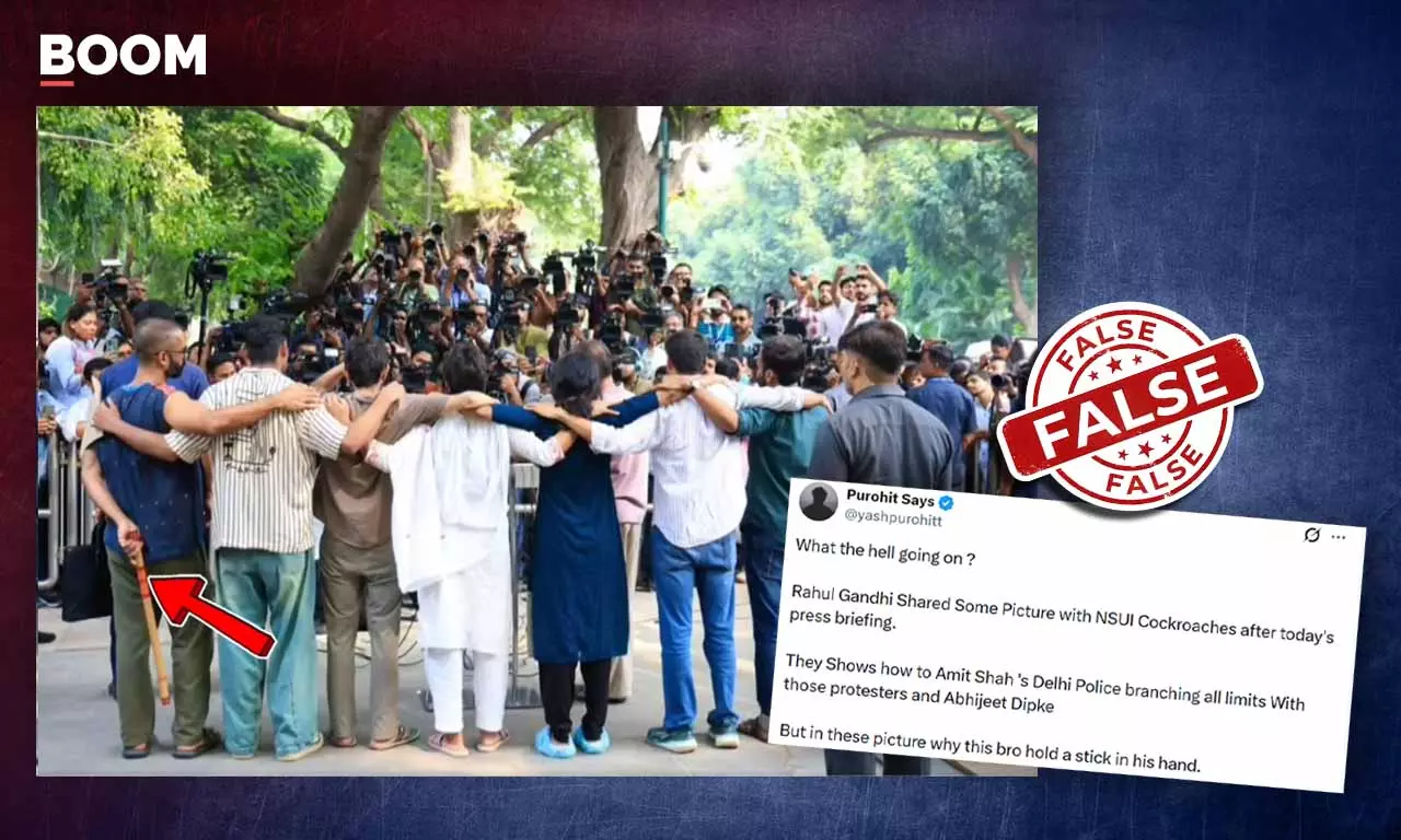 फैक्ट चेक: राहुल गांधी की प्रेस कॉन्फ्रेंस में डंडा नहीं बांसुरी पकड़े था प्रदर्शनकारी